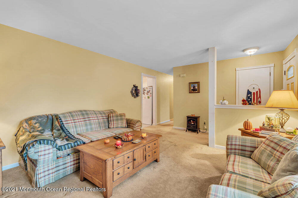 146 Cedar Swamp Road Jackson, NJ 08527 - Photo 14 of 48 a living room with furniture