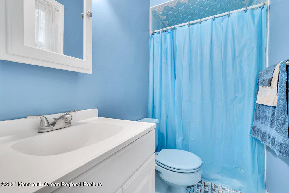 146 Cedar Swamp Road Jackson, NJ 08527 - Photo 20 of 48 a bathroom with a sink and a toilet