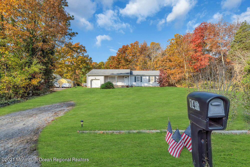 146 Cedar Swamp Road Jackson, NJ 08527 - Photo 3 of 48 a front view of a house with garden