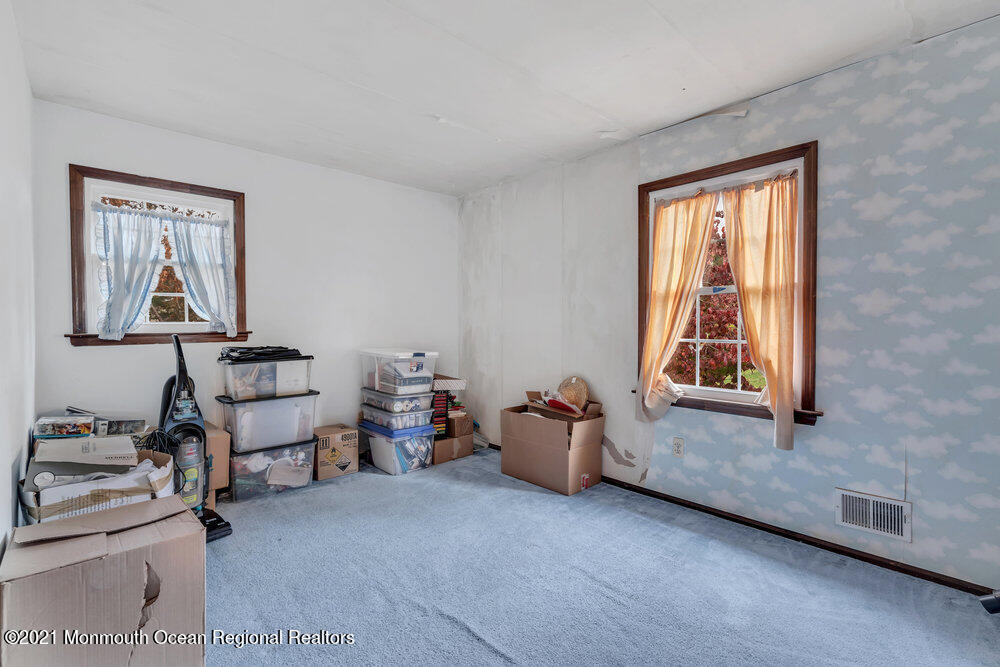 146 Cedar Swamp Road Jackson, NJ 08527 - Photo 21 of 48 a room with furniture and a window