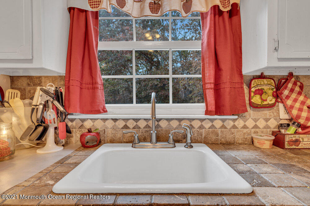146 Cedar Swamp Road Jackson, NJ 08527 - Photo 24 of 48 a view of a sink and a window