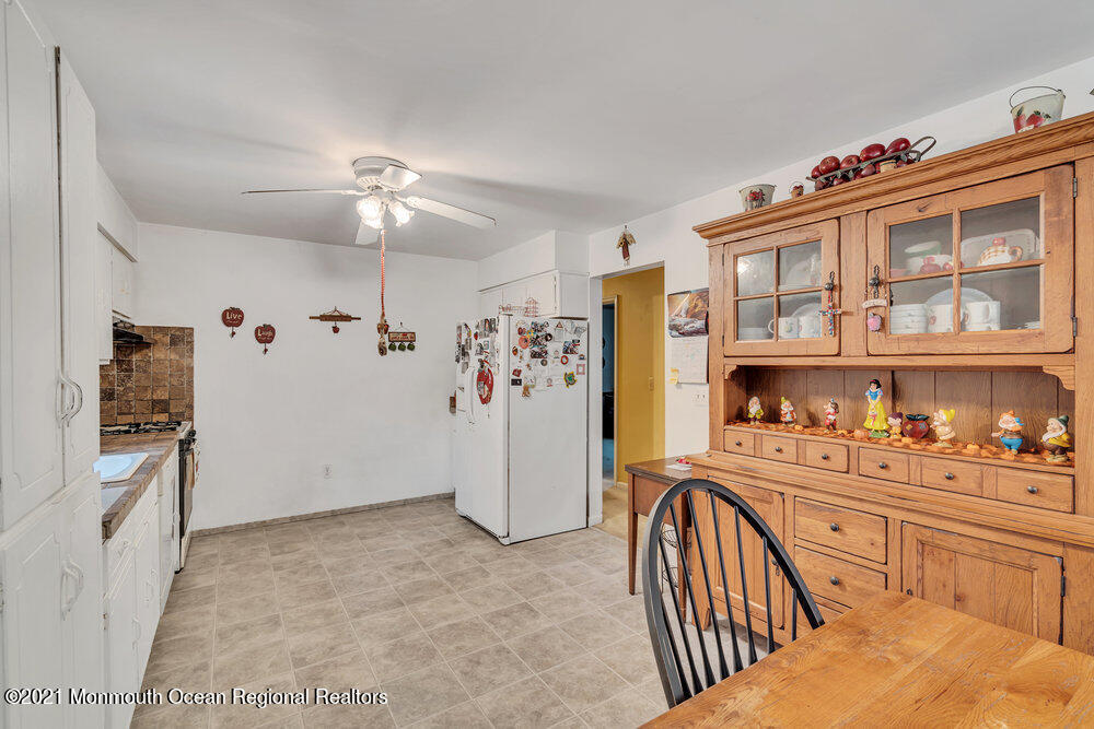 146 Cedar Swamp Road Jackson, NJ 08527 - Photo 27 of 48 a kitchen with stainless steel appliances granite countertop a refrigerator and a stove top oven