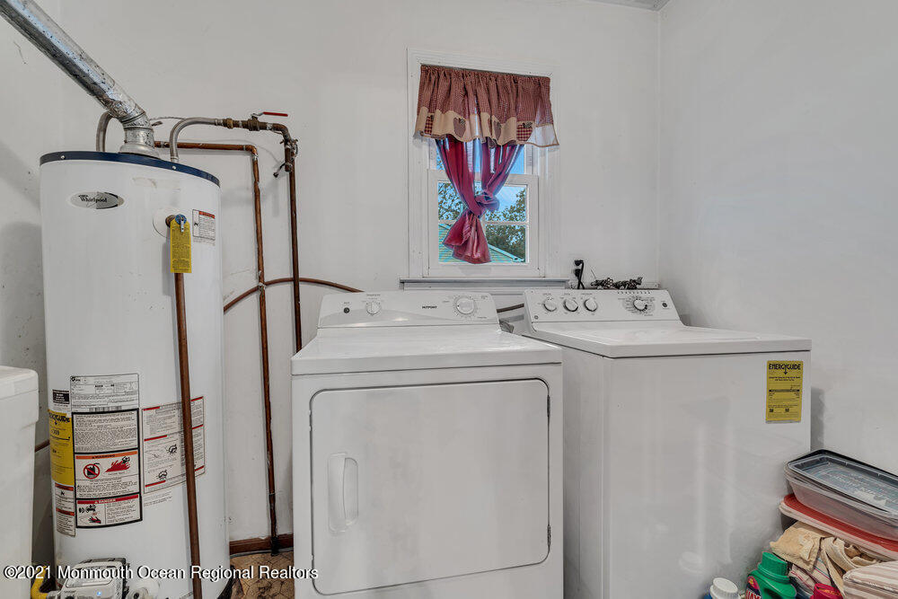 146 Cedar Swamp Road Jackson, NJ 08527 - Photo 31 of 48 a utility room with dryer and washer
