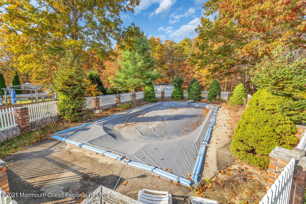 146 Cedar Swamp Road Jackson, NJ 08527 - Photo 45 of 48 a view of a swimming pool with a yard