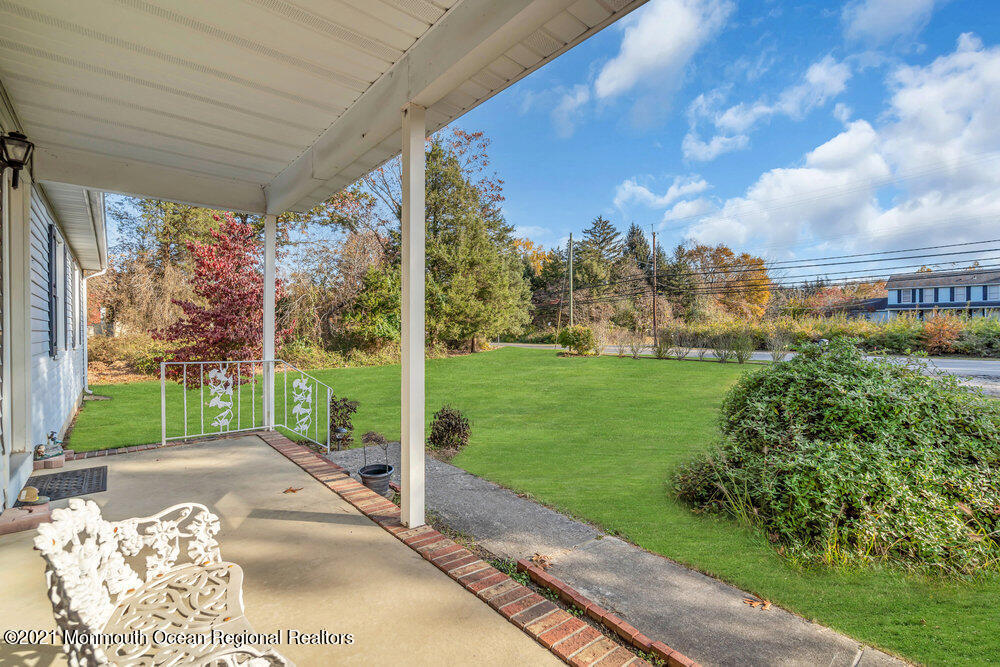 146 Cedar Swamp Road Jackson, NJ 08527 - Photo 7 of 48 a view of a porch with a garden