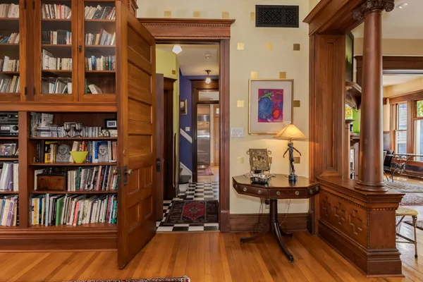 a bedroom with furniture and a window