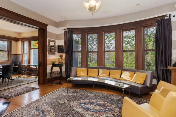 a view of a dining room with furniture window and outside view