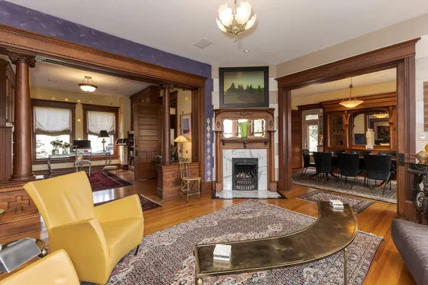 a dining room with furniture and window
