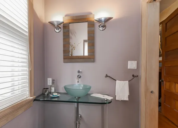 a kitchen with stainless steel appliances granite countertop a stove top oven a counter space and cabinets