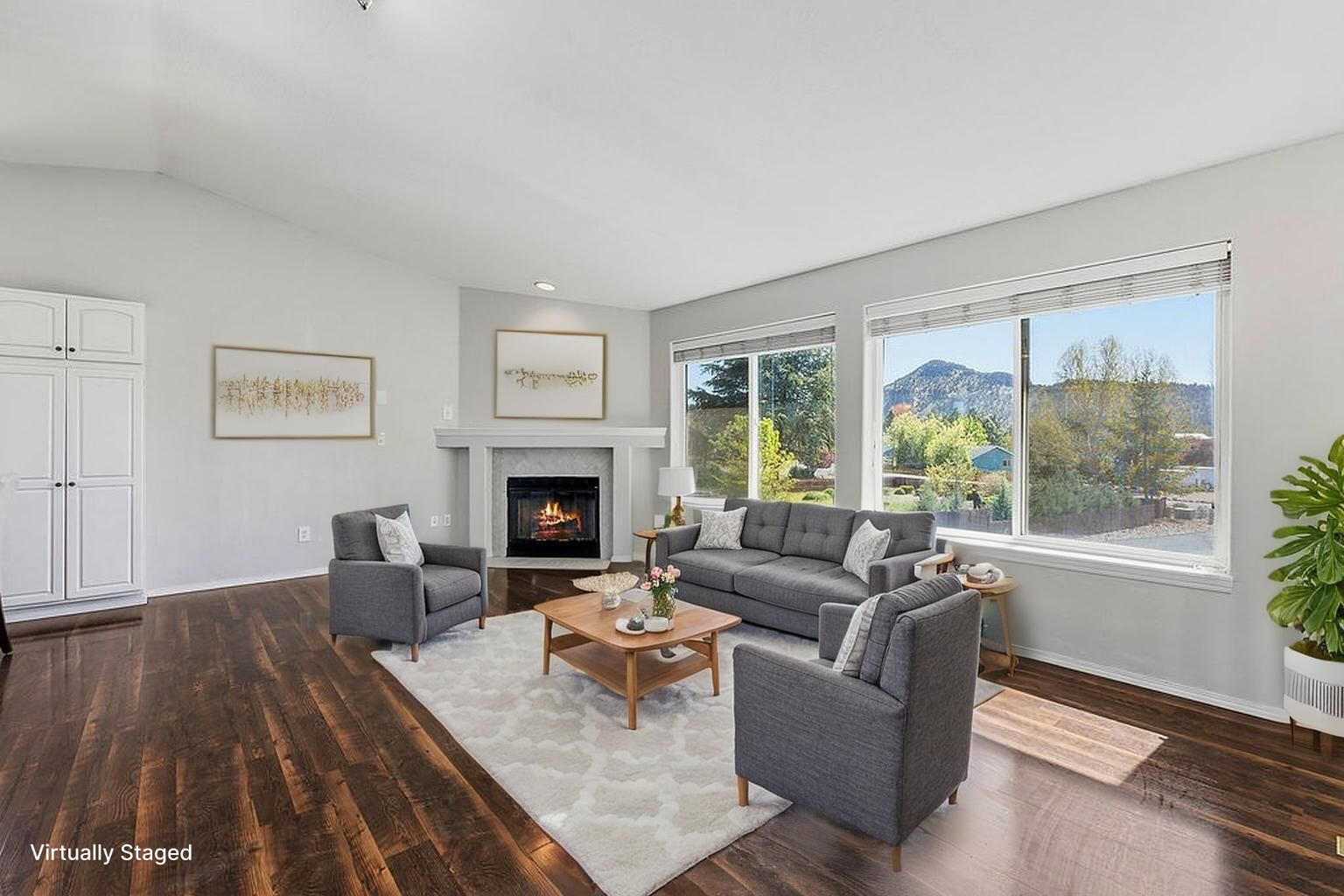 2979 Northeast Sugar Pine Road Prineville, OR 97754 - Photo 2 of 31 a living room with furniture and a fireplace