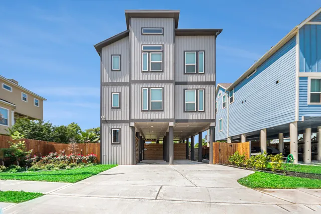 a front view of building with yard