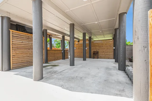 a view of a building with glass door