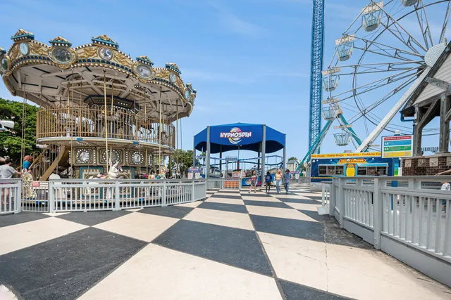 a view of swimming pool with outdoor seating