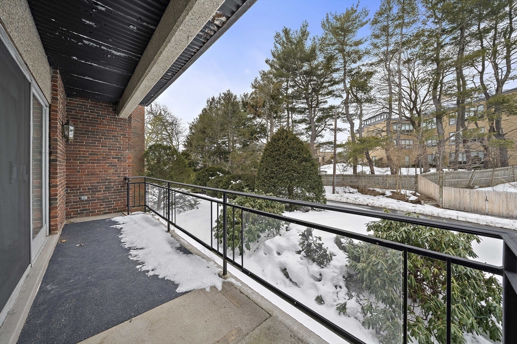 1204 Greendale Avenue, Unit 128 Needham, MA 02492 - Photo 22 of 27 a view of balcony with yard