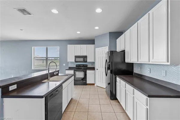 $275,000 | 300 Shadow Lakes Drive, Lehigh Acres, FL 33974