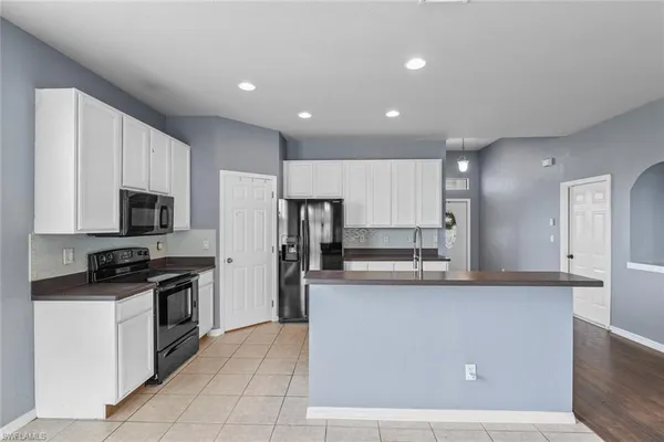 $275,000 | 300 Shadow Lakes Drive, Lehigh Acres, FL 33974