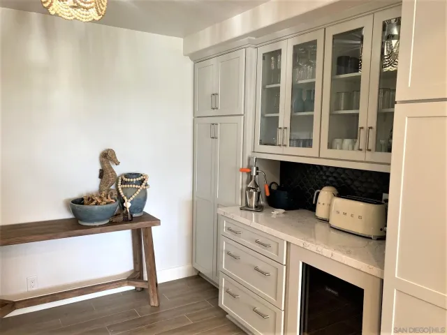 a kitchen with a stove and a microwave