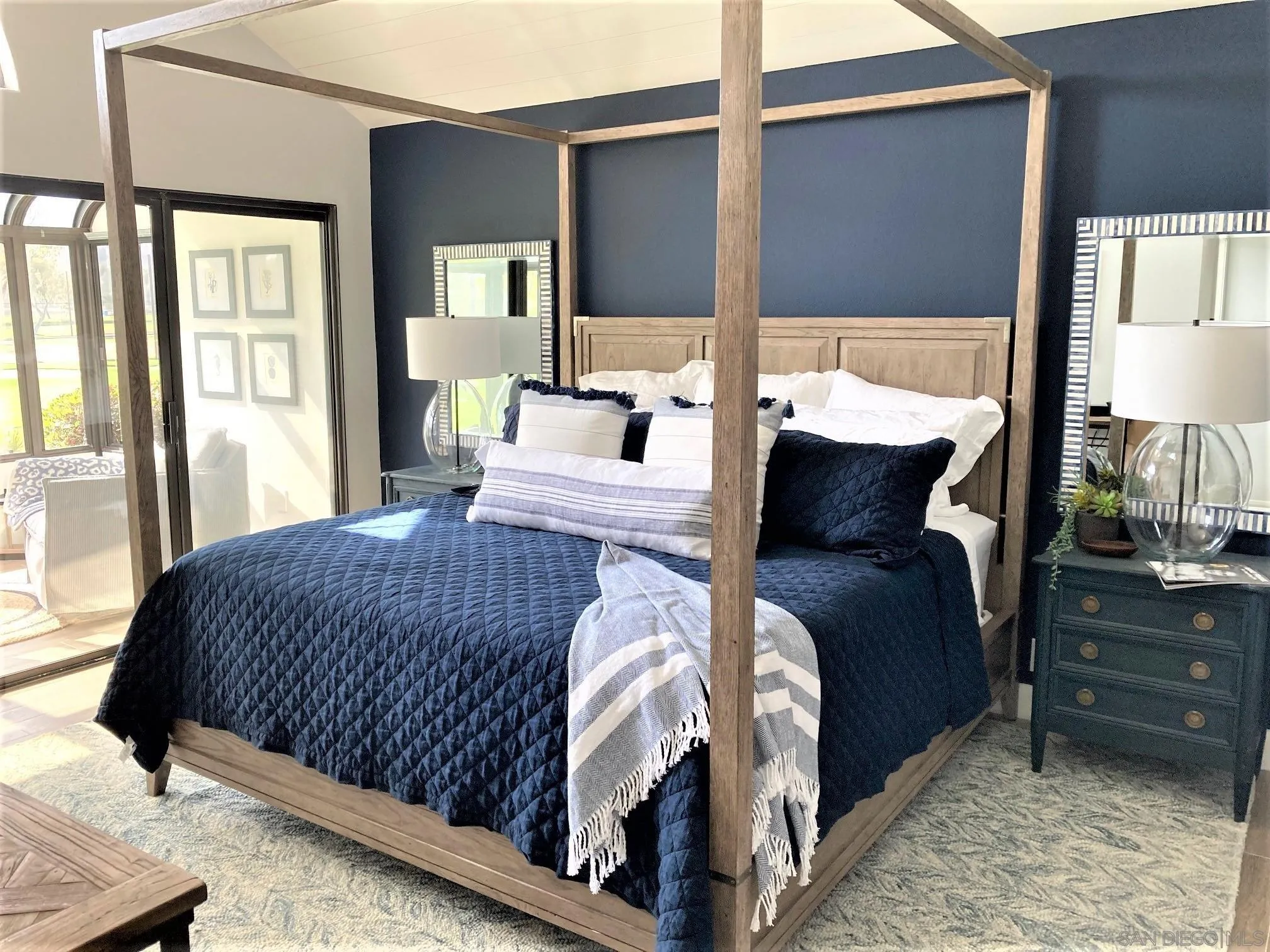 4023 Avenida Brisa Rancho Santa Fe, CA 92091 - Photo 12 of 24 a bedroom with a bed and wooden floor