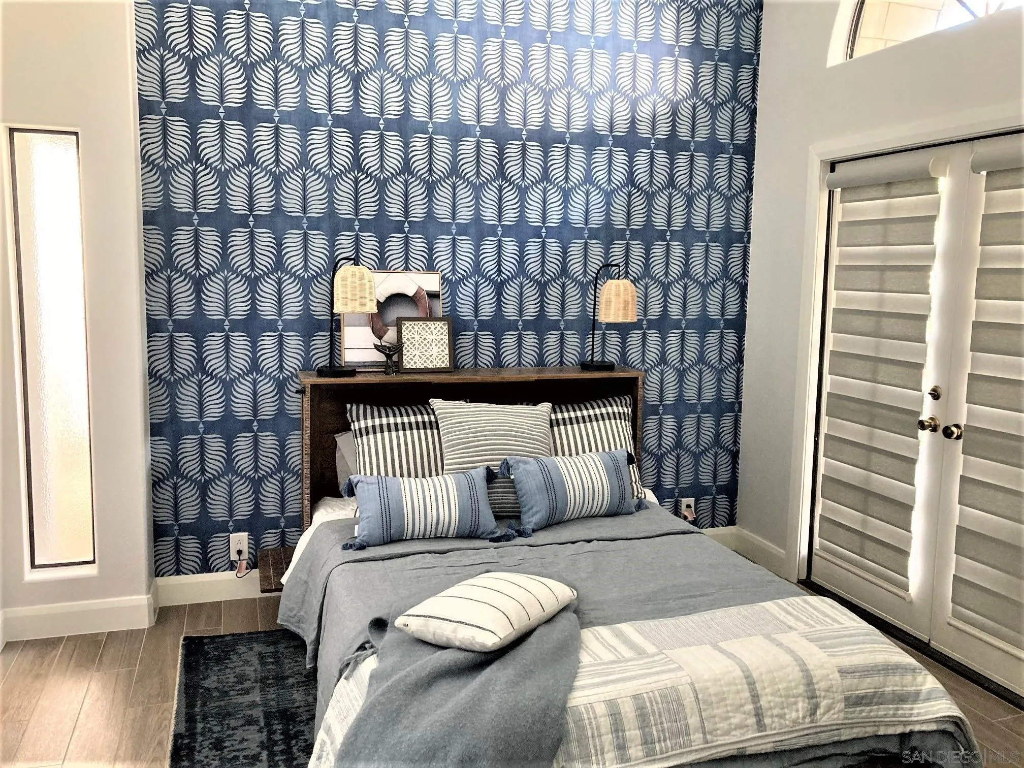 4023 Avenida Brisa Rancho Santa Fe, CA 92091 - Photo 14 of 24 a bedroom with a bed and wooden floor