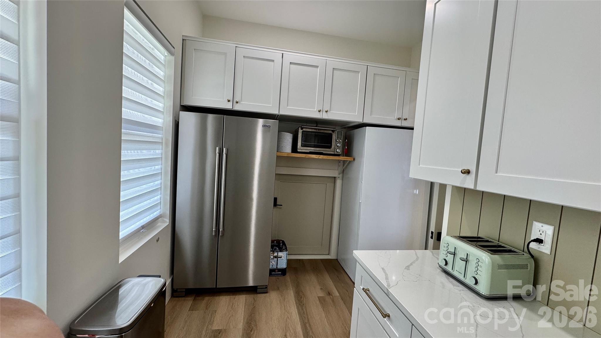 1360 Sain Road Hickory, NC 28602 - Photo 17 of 47 a kitchen with stainless steel appliances granite countertop a refrigerator and a stove