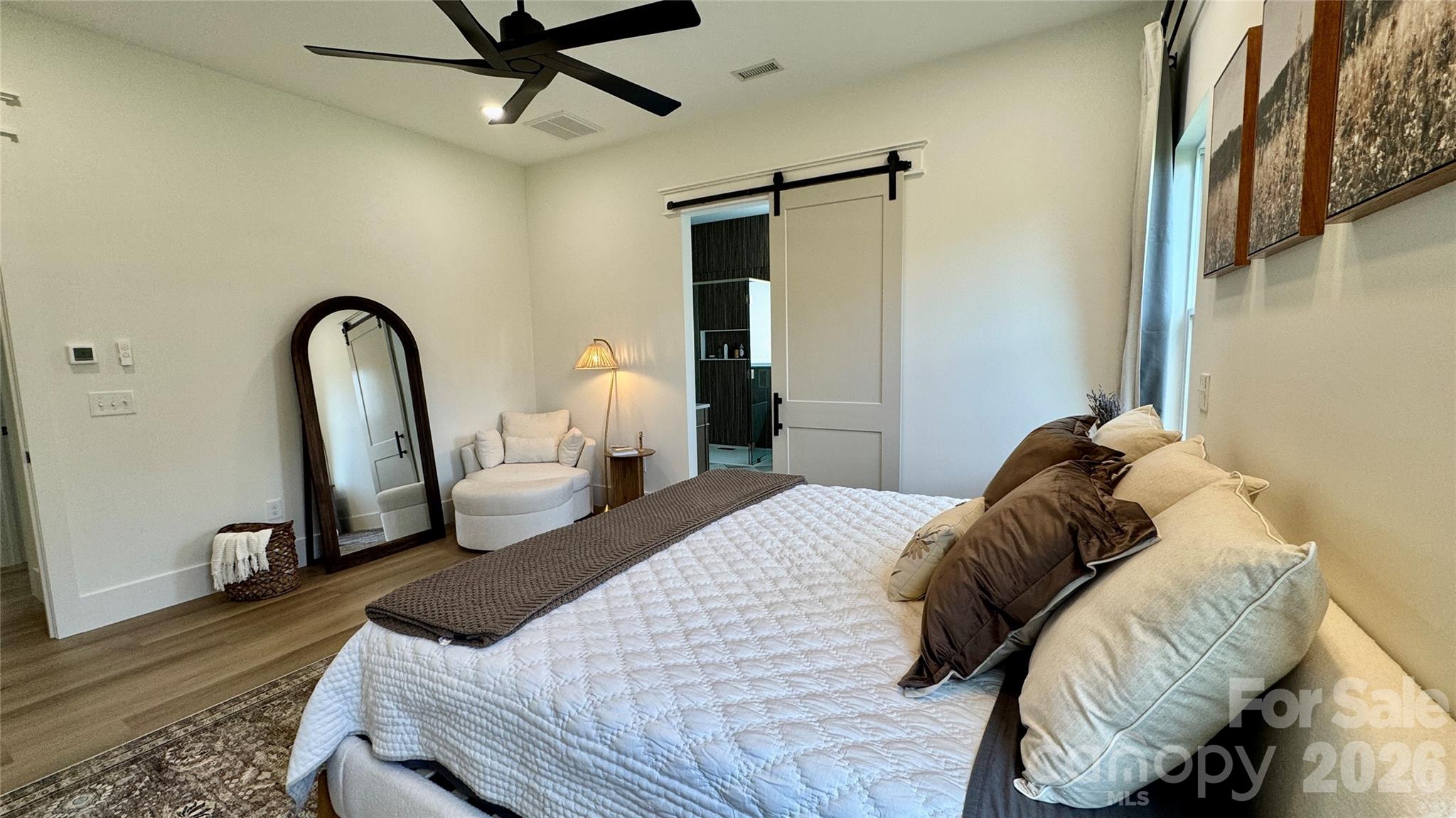 1360 Sain Road Hickory, NC 28602 - Photo 19 of 47 a bedroom with a bed and a mirror