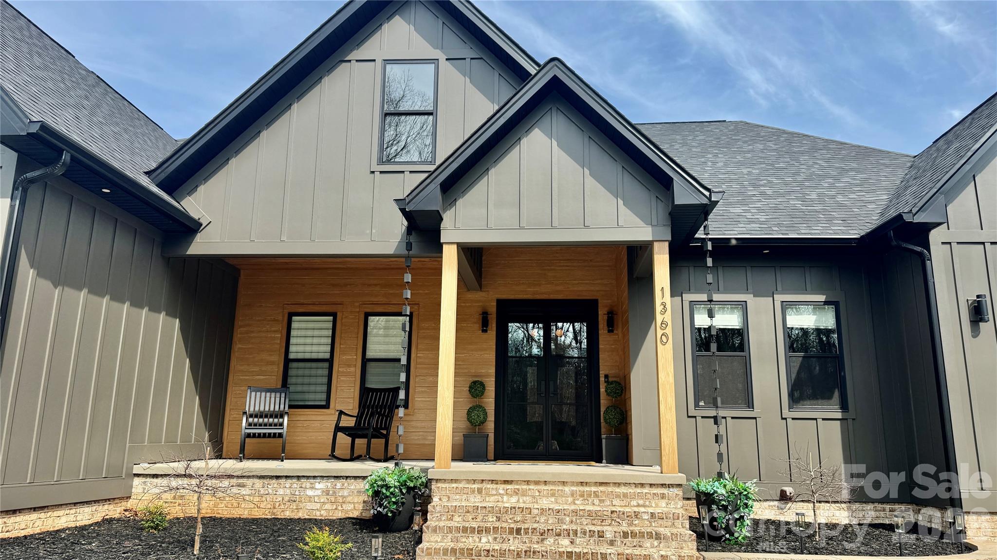 1360 Sain Road Hickory, NC 28602 - Photo 2 of 47 a front view of a house with a porch