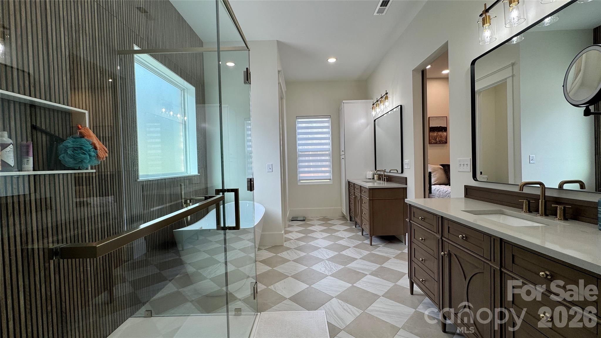 1360 Sain Road Hickory, NC 28602 - Photo 21 of 47 a bathroom with a double vanity sink a mirror and a shower