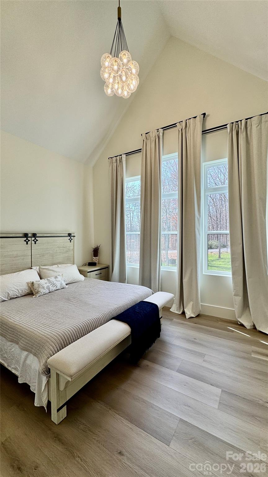 1360 Sain Road Hickory, NC 28602 - Photo 26 of 47 a spacious bedroom with a bed and a window