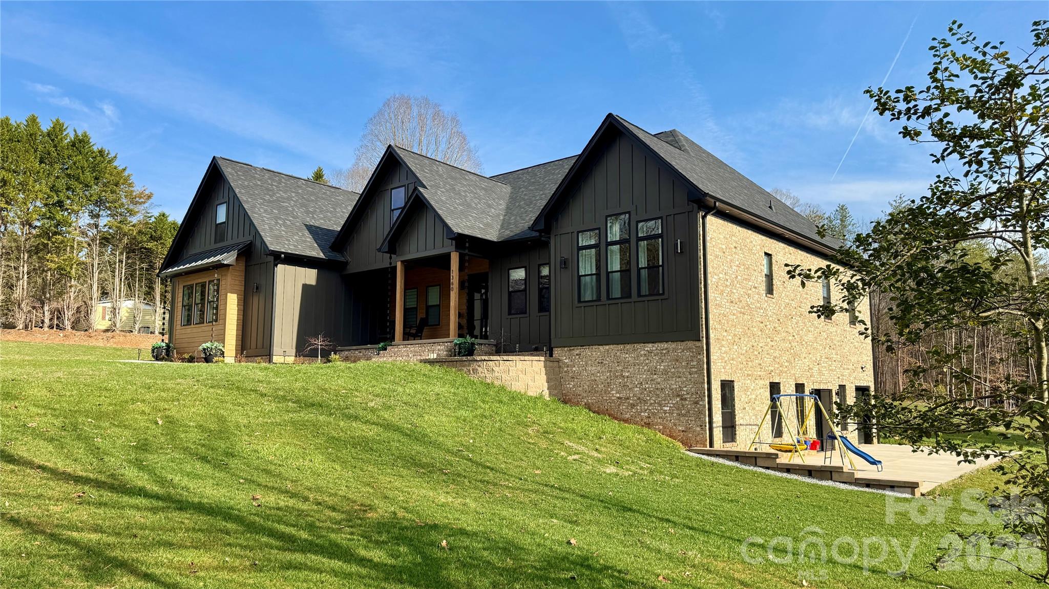 1360 Sain Road Hickory, NC 28602 - Photo 3 of 47 a front view of a house with a yard