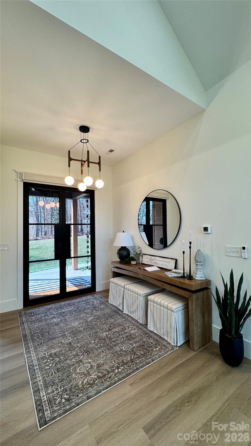 1360 Sain Road Hickory, NC 28602 - Photo 5 of 47 a bedroom with furniture window and potted plants