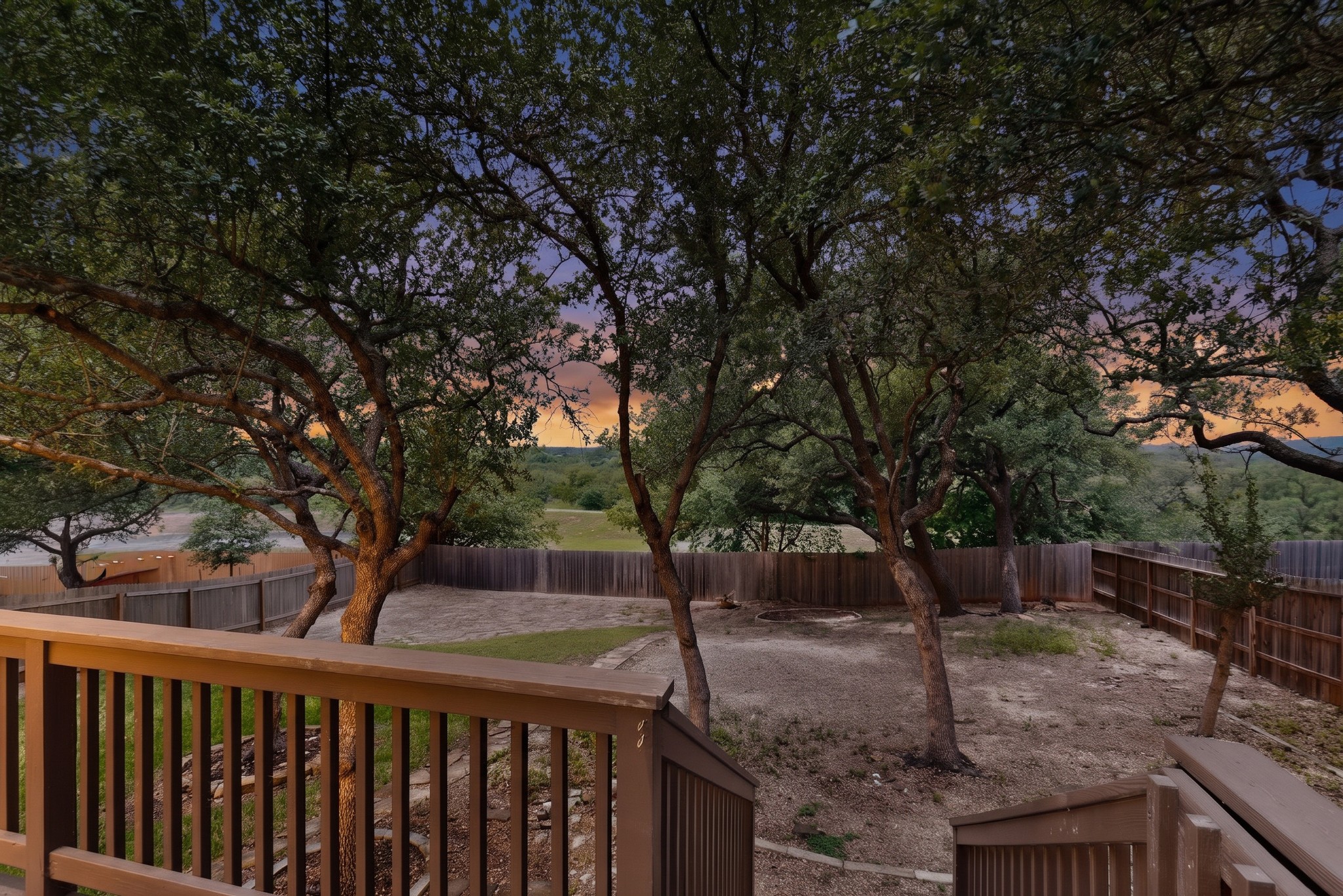 8617 Cobblestone Austin, TX 78735 - Photo 36 of 39 a view of a backyard with large trees