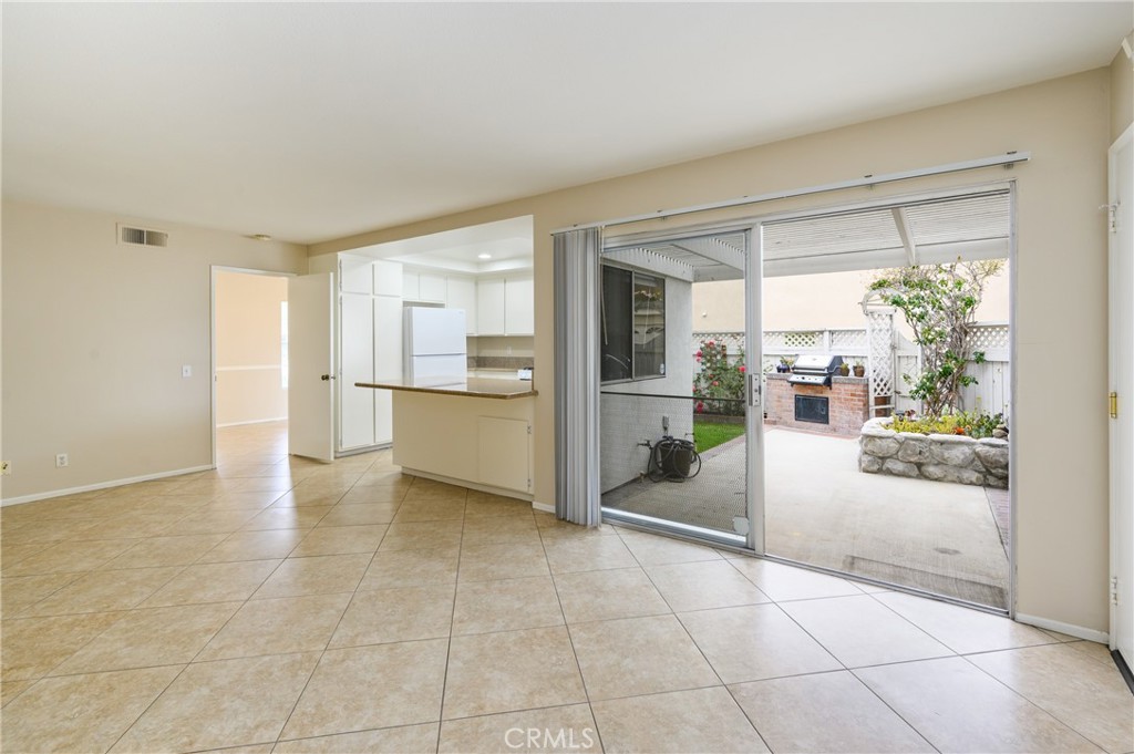 25 Sweet Rain Irvine, CA 92614 - Photo 15 of 45 a view of livingroom with furniture and floor to ceiling window