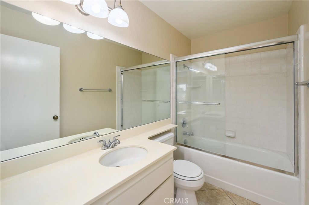 25 Sweet Rain Irvine, CA 92614 - Photo 19 of 45 a bathroom with a sink a toilet and shower