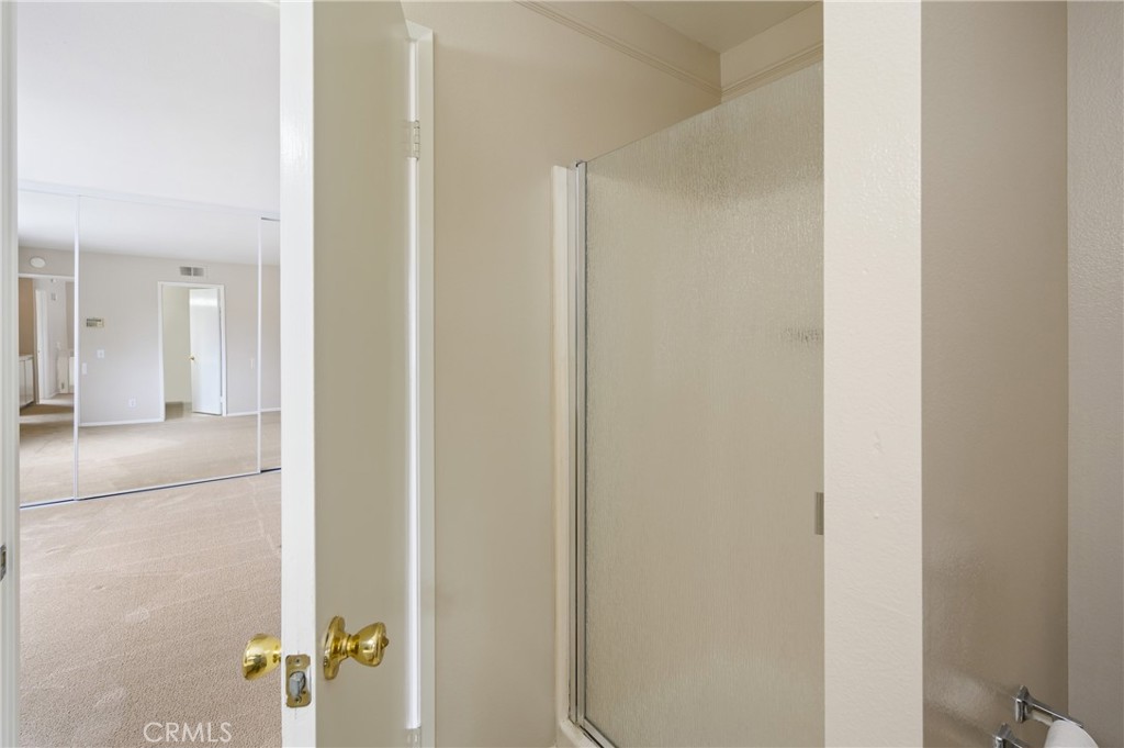 25 Sweet Rain Irvine, CA 92614 - Photo 26 of 45 a bathroom with a shower