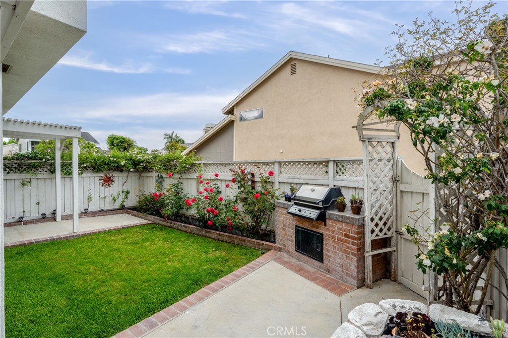 25 Sweet Rain Irvine, CA 92614 - Photo 28 of 45 a view of a backyard with plants and a garden
