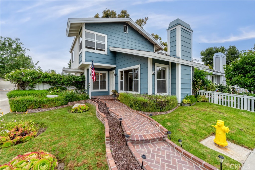 25 Sweet Rain Irvine, CA 92614 - Photo 38 of 45 a front view of a house with garden