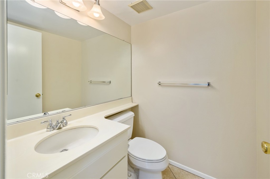 25 Sweet Rain Irvine, CA 92614 - Photo 8 of 45 a bathroom with a sink and a toilet