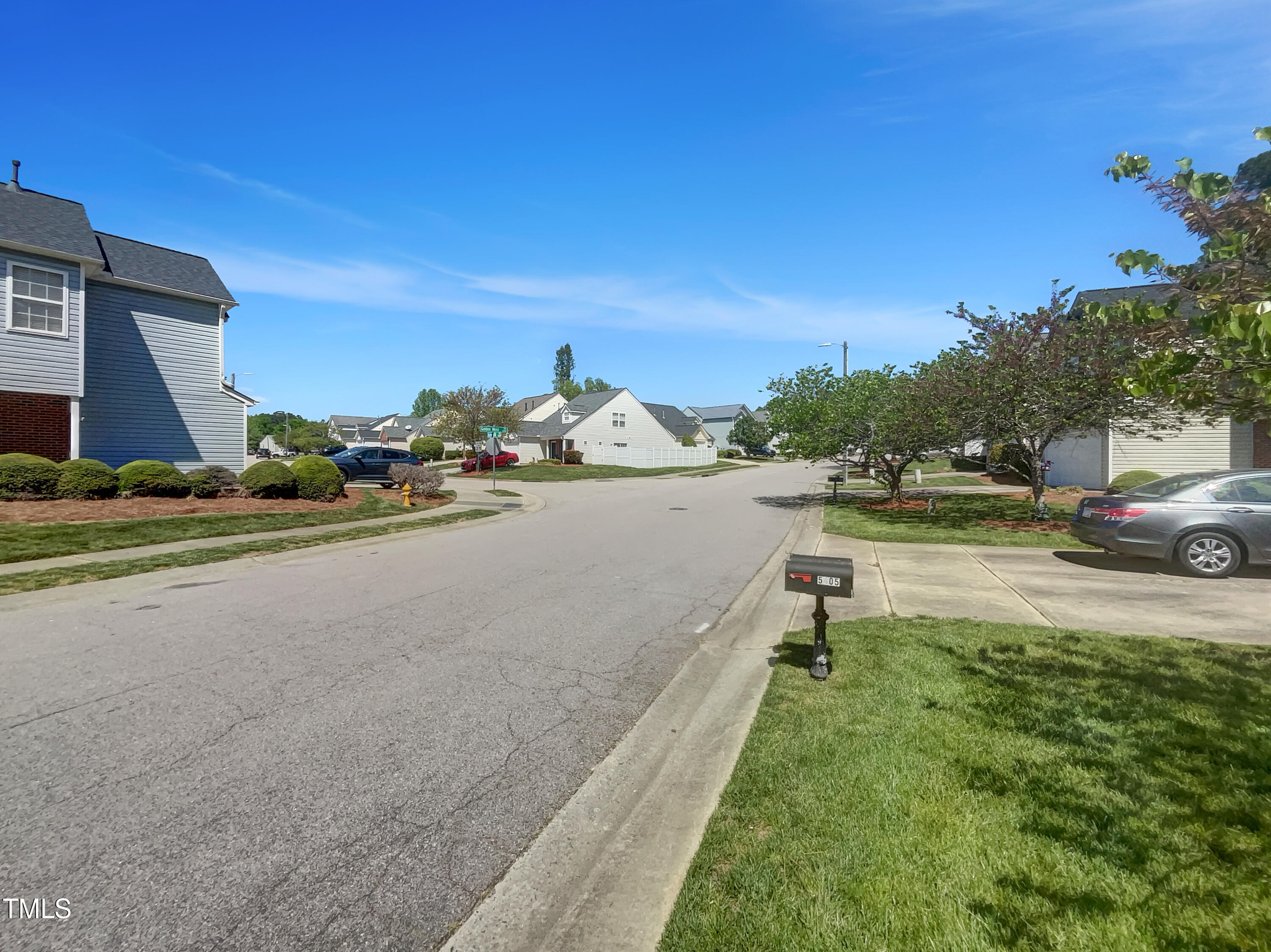 5405 Golden Moss Trail Raleigh, NC 27613 - Photo 8 of 17 a view of a street with houses