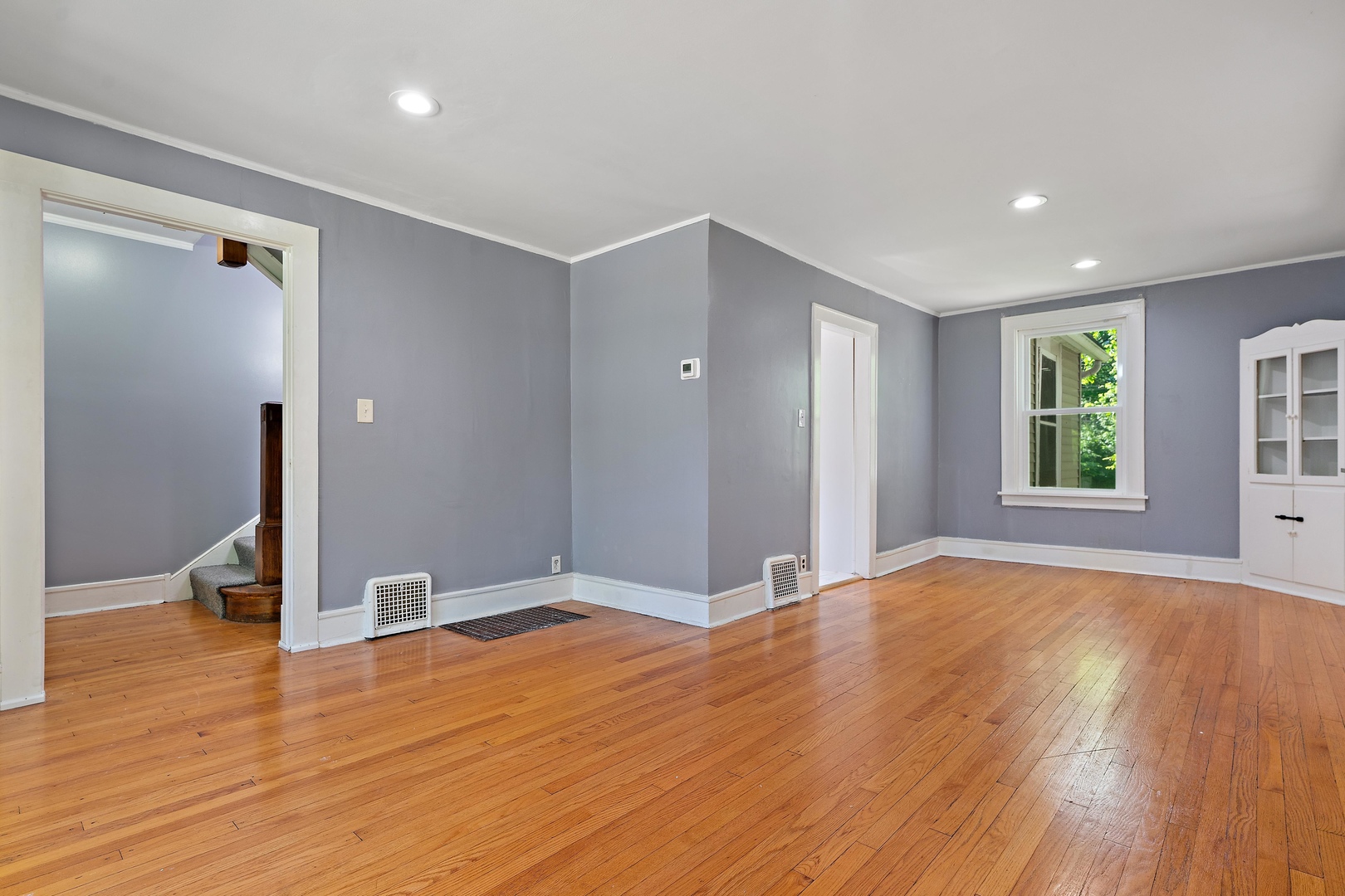 1643 Pine Road Homewood, IL 60430 - Photo 4 of 20 a view of empty room with wooden floor and fan