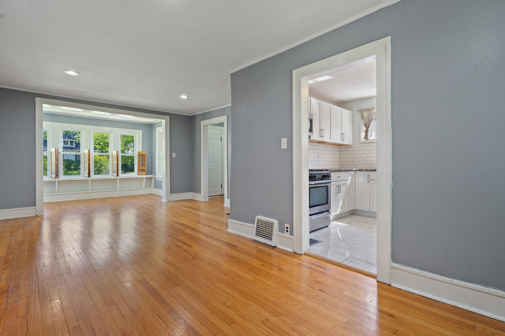 1643 Pine Road Homewood, IL 60430 - Photo 6 of 20 a view of empty room with wooden floor and fan