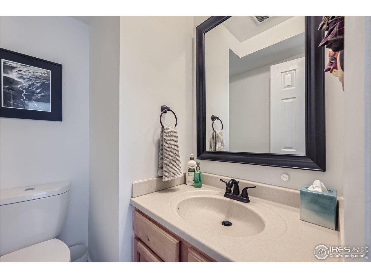 1175 Bear Mountain Drive, Unit A Boulder, CO 80305 - Photo 11 of 31 a bathroom with a sink and a mirror
