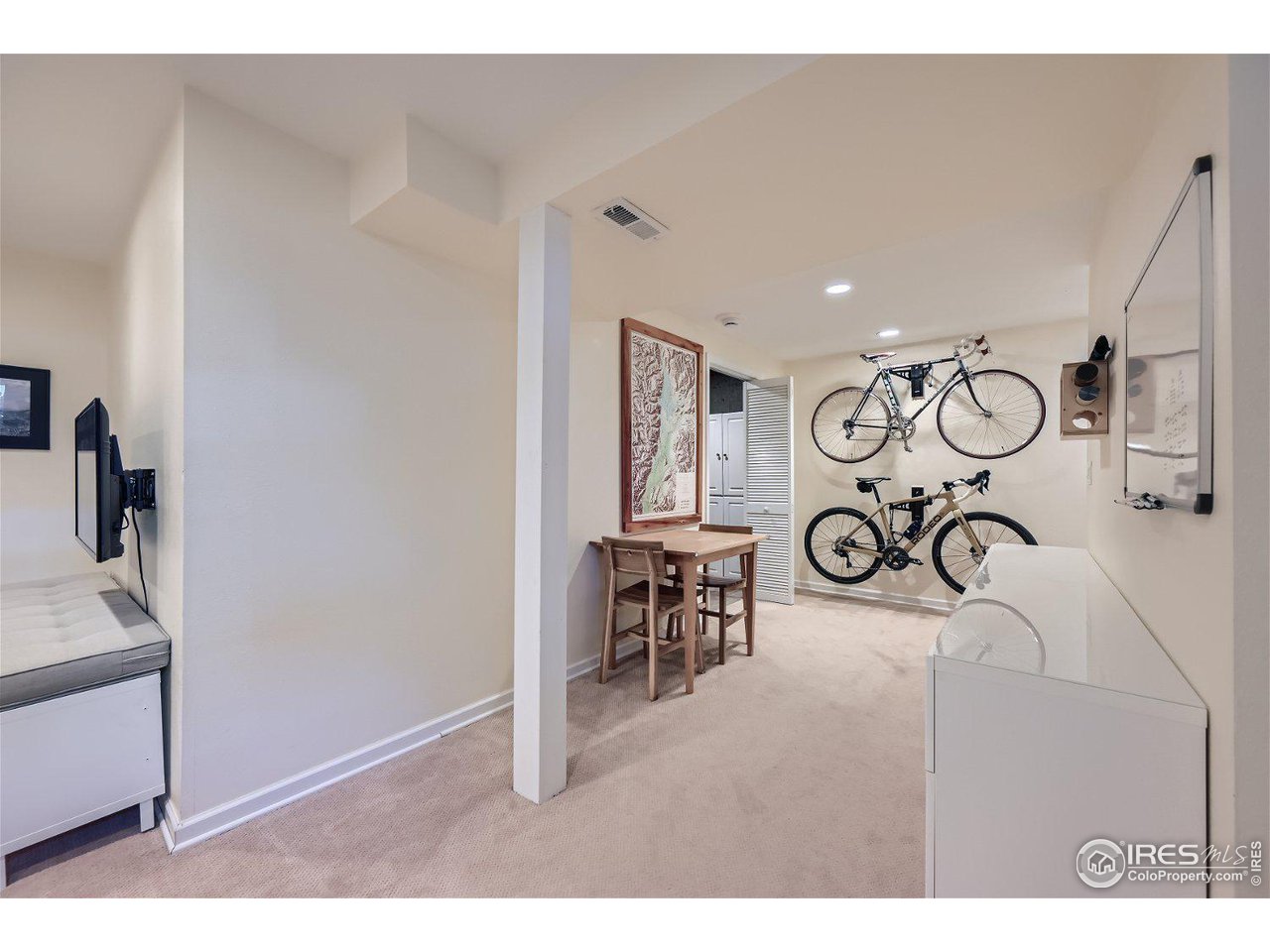 1175 Bear Mountain Drive, Unit A Boulder, CO 80305 - Photo 21 of 31 a room with lots of wooden furniture