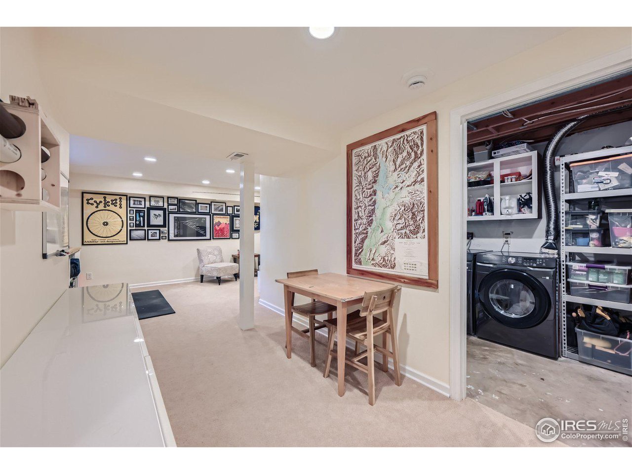 1175 Bear Mountain Drive, Unit A Boulder, CO 80305 - Photo 22 of 31 a living room with furniture and a flat screen tv