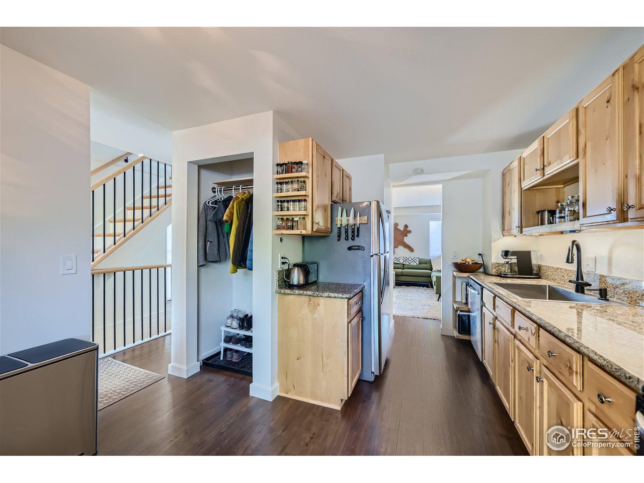 1175 Bear Mountain Drive, Unit A Boulder, CO 80305 - Photo 5 of 31 a kitchen with stainless steel appliances granite countertop a refrigerator a stove top oven a sink and dishwasher