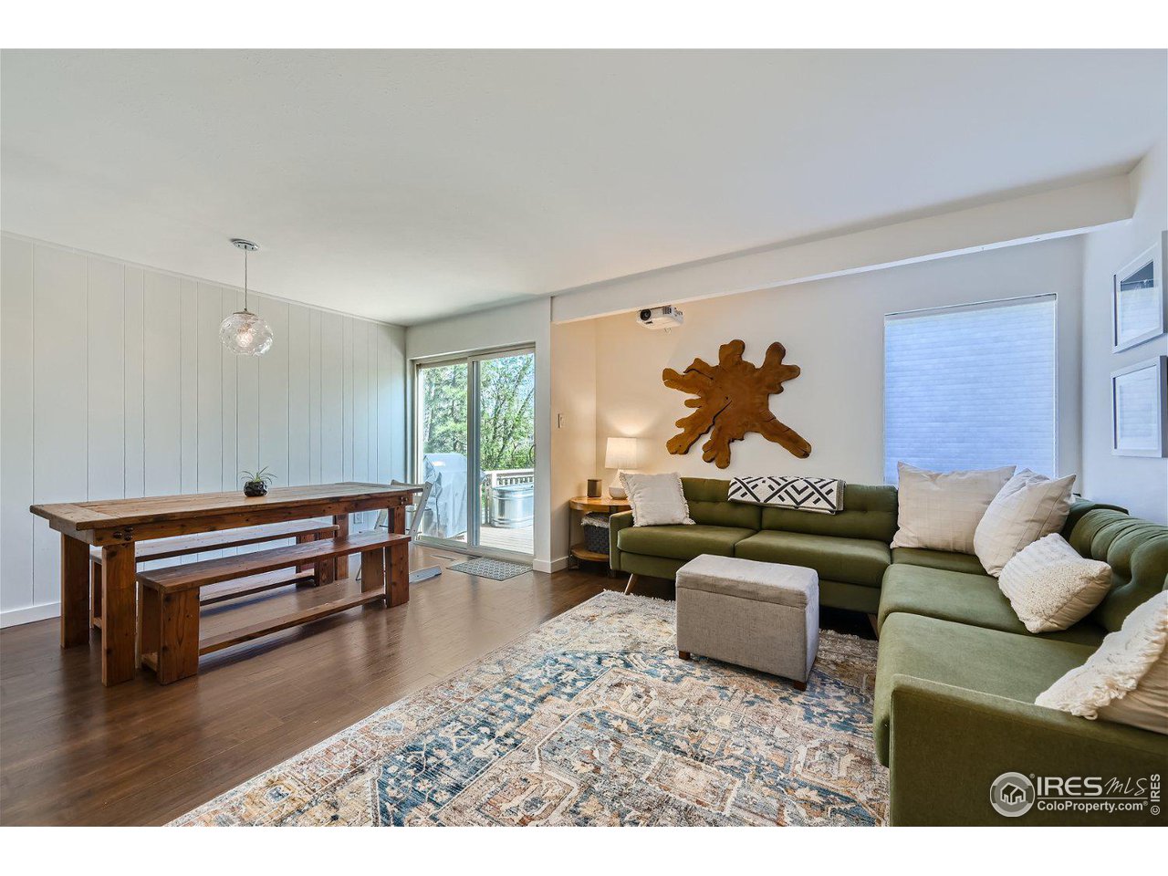 1175 Bear Mountain Drive, Unit A Boulder, CO 80305 - Photo 8 of 31 a living room with furniture and a wooden floor