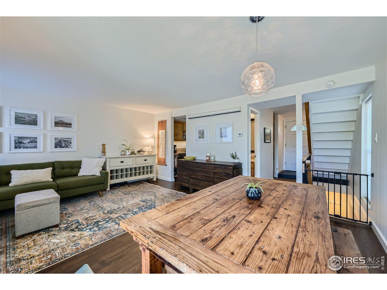 1175 Bear Mountain Drive, Unit A Boulder, CO 80305 - Photo 10 of 31 a living room with furniture and a wooden floor