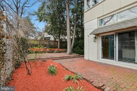 a view of front door with wooden floor