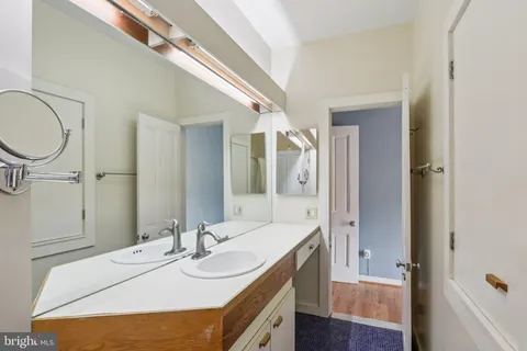 a white toilet sitting next to a window