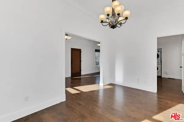 a view of a livingroom with wooden floor