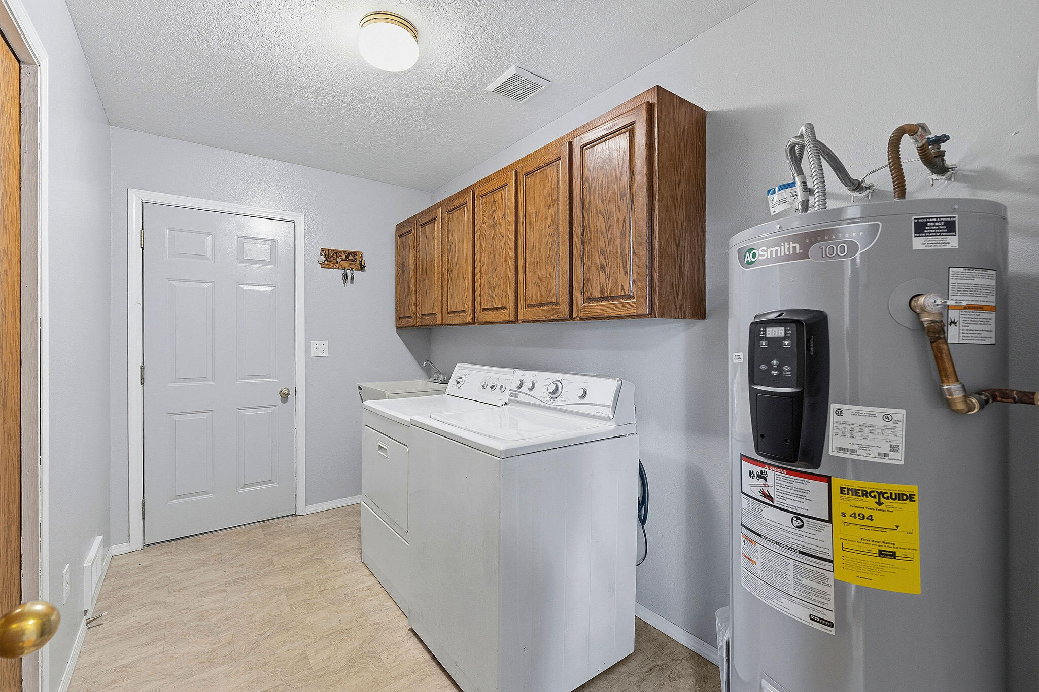 1945 Northeast Gentry Road Madras, OR 97741 - Photo 15 of 27 Laundry Room